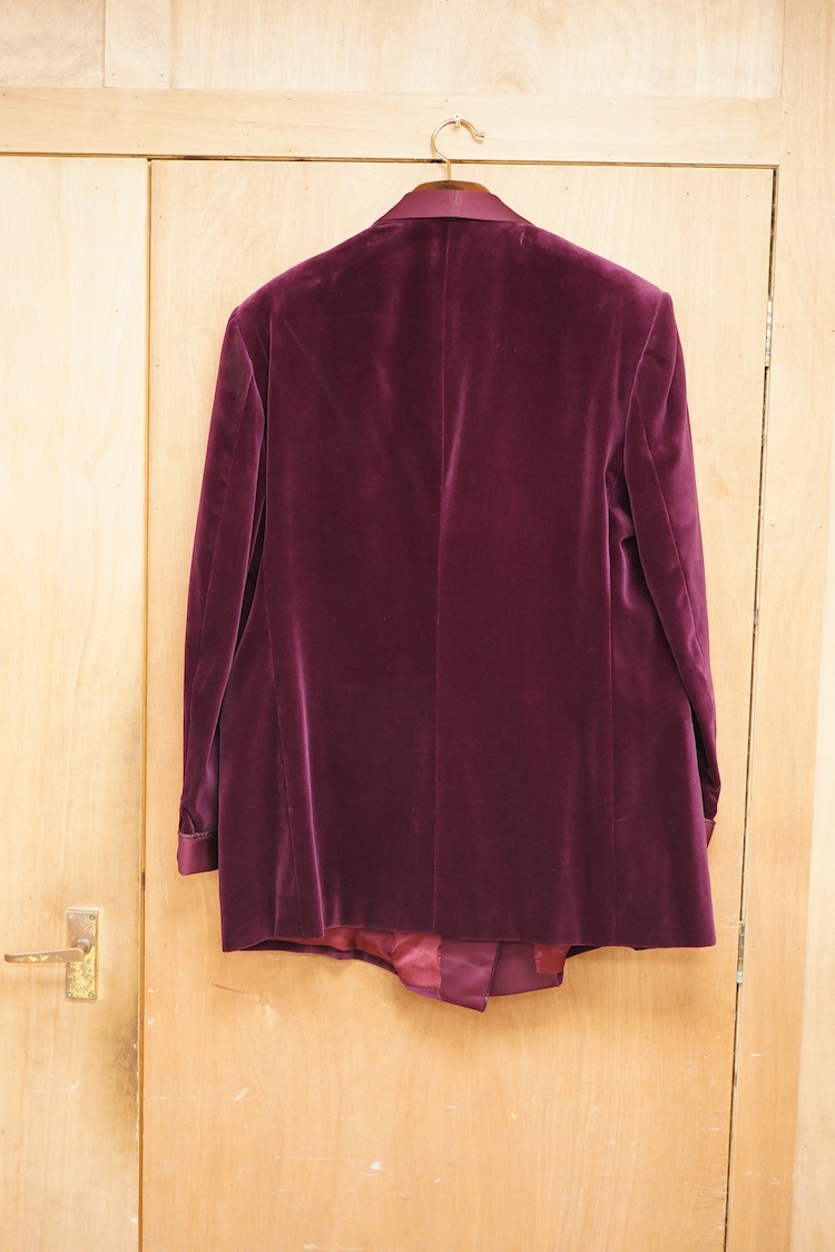 The property of a titled gentleman: A Redwood & Feller maroon velvet mid 20th century gentleman’s smoking jacket, with maroon silk cuff and collar detail, front chest 56cm.